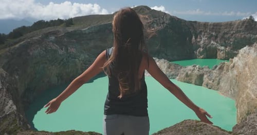 Tourist Woman on Volcano Kelimutu Crater Lakes
