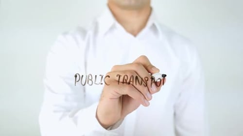 Man Writes Public Transport on Clear Surface