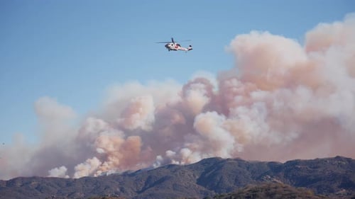 In Malibu Helicopters are Bravely Battling the Raging Flames