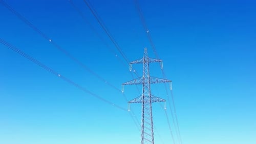 Electrical Transmission Tower Under Blue Sky
