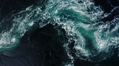 Waves of Water of the River and the Sea Meet Each Other During High Tide and Low Tide