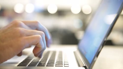 Handsome Man in Suit Work Using Laptop Computer in the Office. Businessman