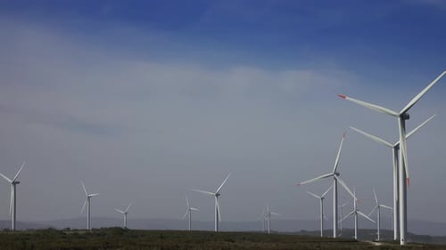 Windmills or Wind Turbine in Rotation