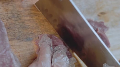 Close Up of Chopping Meat on a Board