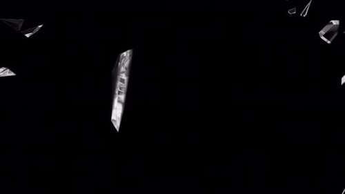 Glass breaks in the center and the shards fly in different directions.