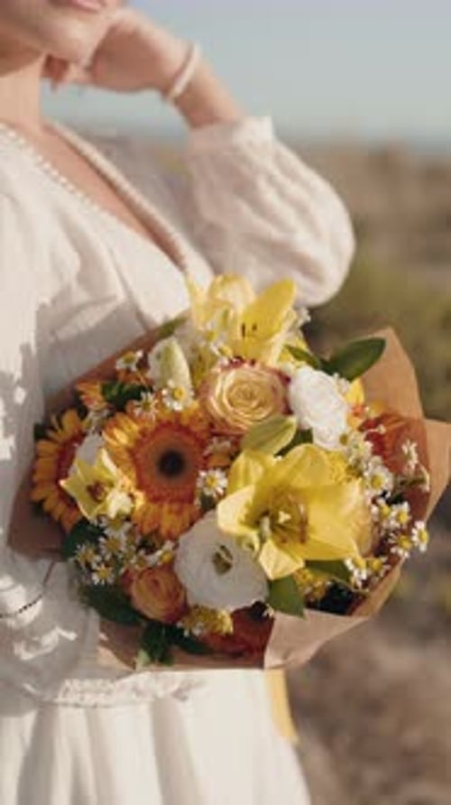 Woman Holding Flower Bouquet