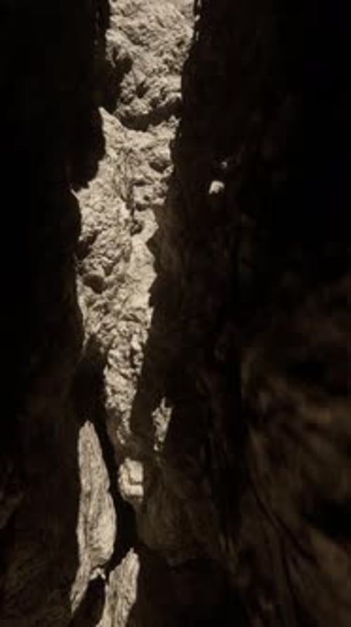 A Narrow Passage Between Two Large Rocks