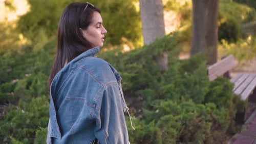 Girl walks in the park