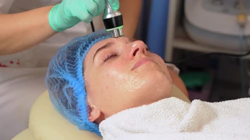 Cosmetological Innovations Skin Massage in Professional Beauty Studio