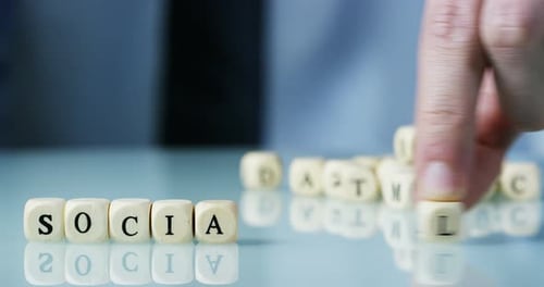 Dice Spelling the Word Social