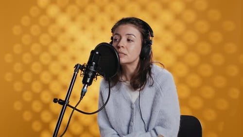 Woman Recording Voiceover Reading from Book