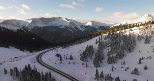 Aerial views of winding roads in the Colorado Rocky Mountains