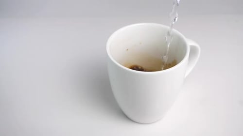 Making Instant Coffee with Hot Water in a Mug