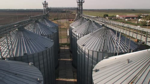 Aerial View of Grain Silos on Farm