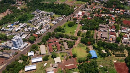 Drone flyover at Foz do Iguacu, Brazil, showing city, buildings and river
