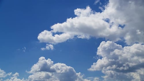 Clouds Float on Clear Blue Sky Time-Lapse