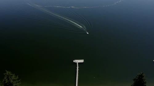 Drone flying over puget sound panning up to Mt. Rainier