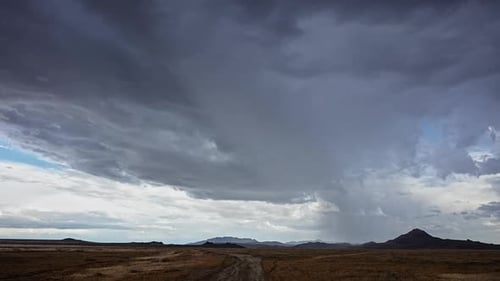 Timelapse of rainstorm moving over the desert in Utah
