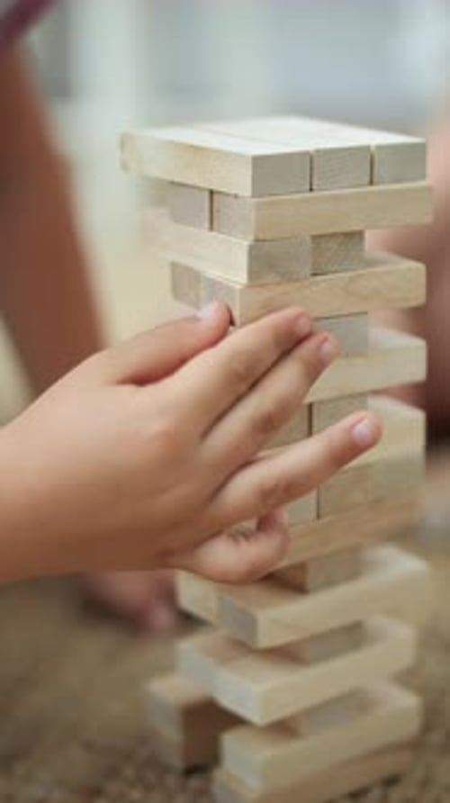 Wooden Tower Made of Jenga Blocks Close Up