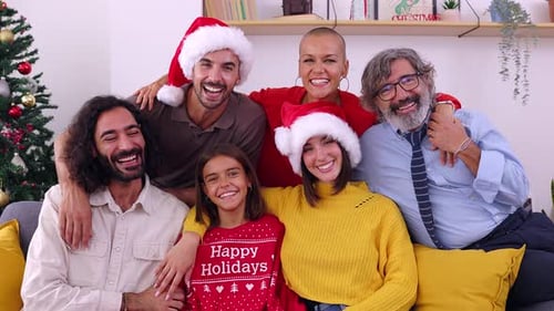 Family Celebrates Christmas Together in Cozy Home Setting