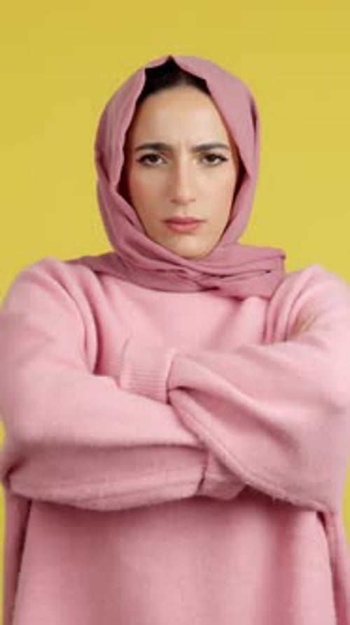 Woman in Headscarf Displays Range of Emotions
