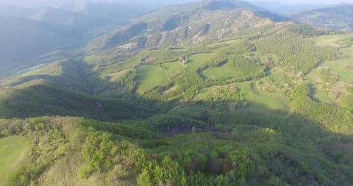 View from the drone, on a sunny day view of the terrain,trees, hills, the concept: ecology, bio.