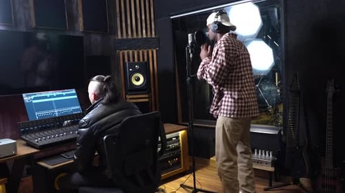 Singer recording new album in professional studio