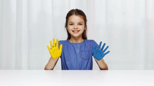 Education, School, Creativity, Art and Painting Concept - Smiling Little Student Girl