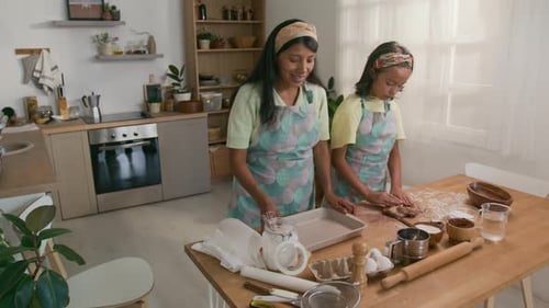 Mother and Daughter Baking Homemade Pastry Together