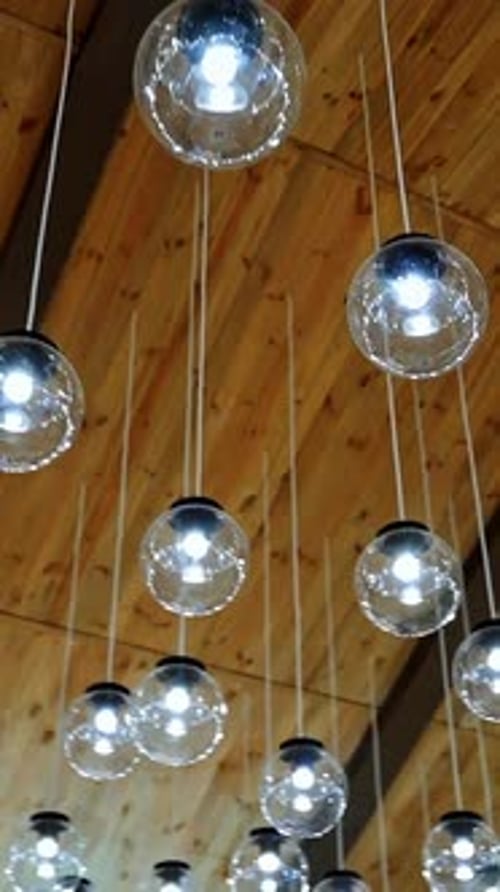 Luxury beautiful light lamp. Set of glowing lamp hanging on the wire