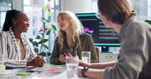 Team Meeting in Modern Office Discussing Technology