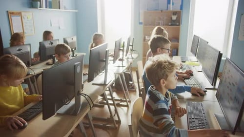 Elementary School Computer Science Classroom: Diverse Group of Little Smart Schoolchildren using Pe