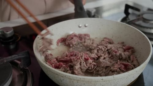 Sliced Beef Cooking in a Pan