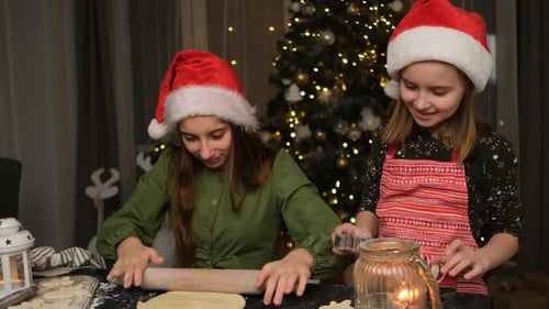 Children Making Christmas Cookies in Cozy Home Setting