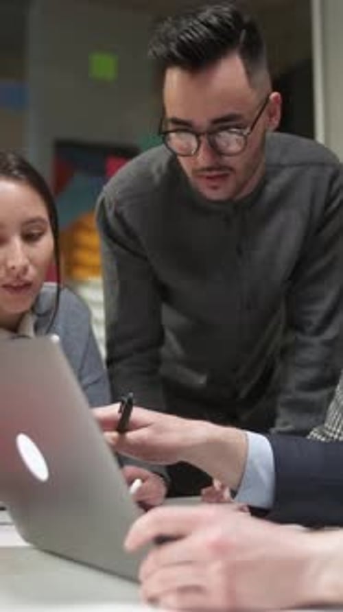 In Creative Office Productive Coworkers Standing at the Table Company Meeting Colleagues and Clients