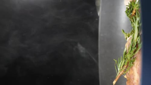 Close Up of Food with Rosemary and Steam