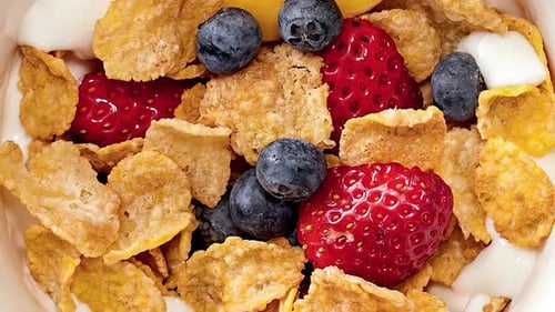 Healthy Breakfast Cereal with Fresh Berries and Mango