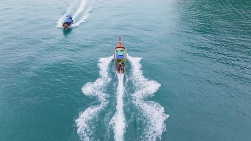 Aerial View of Longtail Boats in the Beautiful Waters of Krabi Thailand