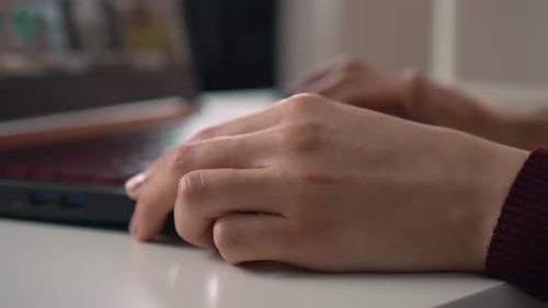 Close Up Skilled Business Woman Typing and Scrolling on Laptop Keyboard at Home Office Desk