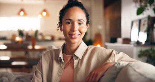 Face, woman and relax on couch, lounge and happy on break in home, thinking