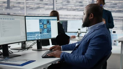 Man and Woman Modeling Integrated Circuit Systems with PC Software