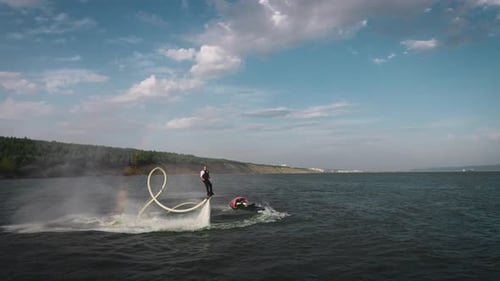 An Office Clerk Flies a Flyboard After a Day's Work