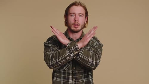 Man Say No Hold Palm Folded Crossed Hands in Stop Gesture Warning of Finish Prohibited Access