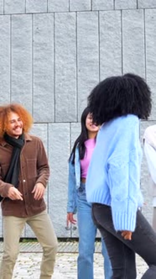 Woman Dancing in the Middle of Multiethnic Friends in the Street