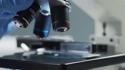 Microscope Lenses Rotate in Medical Laboratory