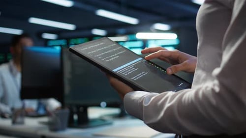 Engineer Working in Data Center Used for Managing Infrastructure Rigs