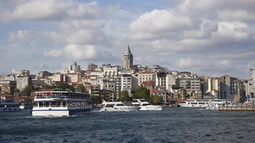 Ferries in Istanbul with a View of the Galata Tower