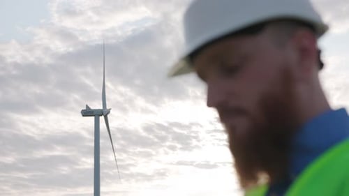 NEW YORK 19 May 2019 Closeup of Bearded Ginger Young Technical Engineer in Helmet Protective Suit