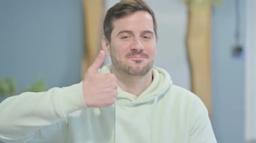 Man Giving Thumbs Up Approval Close Up