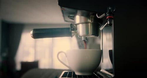 Espresso Machine Fills Steaming Cup With Fresh Coffee